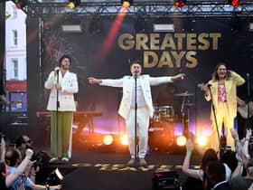  Take That (L-R) Howard Donald, Gary Barlow and Mark Owen perform on stage during Take That's "Greatest Days" World Premiere at the Odeon Luxe Leicester Square on June 15, 2023 in London, England. (Photo by Gareth Cattermole/Getty Images)
