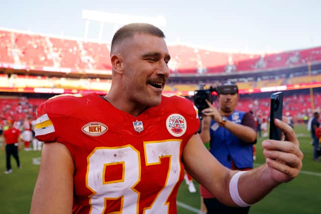 Travis Kelce #87 of the Kansas City Chiefs talks on his phone after a game against the Chicago Bears at GEHA Field at Arrowhead Stadium on September 24, 2023 in Kansas City, Missouri. (Photo by David Eulitt/Getty Images)