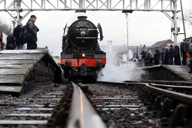 The Flying Scotsman pulls carriages during a test run along the East Lancashire line for the first time in ten years in January 2016 in Bury (Photo: Nigel Roddis/Getty Images)