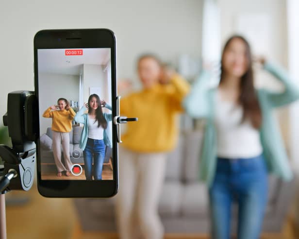 A university is offering the first ever UK degree which will teach people how to become a professional social media influencer. Image by Adobe Photos.