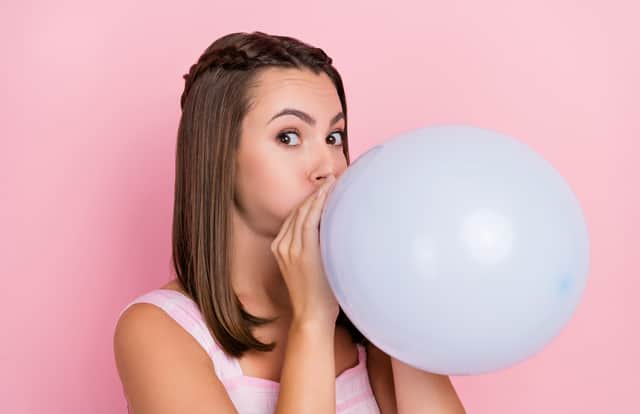 A mum has gone viral on TikTok by revealing the disgusting reason why people should wash balloons before blowing them up. Image by Adobe Photos.