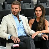 Inter Miami's co-owner David Beckham sits with his wife, English fashion designer Victoria Beckham, prior to the Leagues Cup football match between Inter Miami CF and Atlanta United FC at DRV PNK Stadium in Fort Lauderdale, Florida, on July 25, 2023. (Photo by CHANDAN KHANNA / AFP) (Photo by CHANDAN KHANNA/AFP via Getty Images)