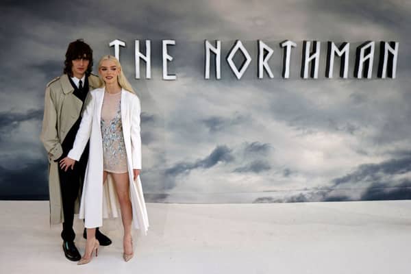 British-US actor Anya Taylor-Joy and her partner, musician Malcolm McRae pose on the red carpet upon arrival for the special screening of "The Northman" at the Odeon Leiceseter Square cinema in London, on April 5, 2022. (Photo by Tolga Akmen / AFP) (Photo by TOLGA AKMEN/AFP via