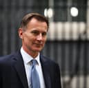 Chancellor Jeremy Hunt is expected to announce that the national living wage will increase to at least £11 per hour. (Credit: Getty Images)