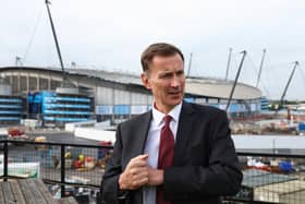 Jeremy Hunt tours the construction site of the Co-op Live indoor entertainment arena during Britain's Conservative Party's annual conference on 2 October in Manchester (Photo: Toby Melville - WPA Pool/Getty Images)