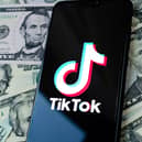 TikTok is testing a paid for ad-free version of their app. Image by Adobe Photos.