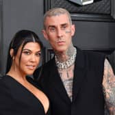 Kourtney Kardashian and musician Travis Barker arrive for the 64th Annual Grammy Awards at the MGM Grand Garden Arena in Las Vegas on April 3, 2022. (Photo by ANGELA  WEISS / AFP) (Photo by ANGELA  WEISS/AFP via Getty Images)