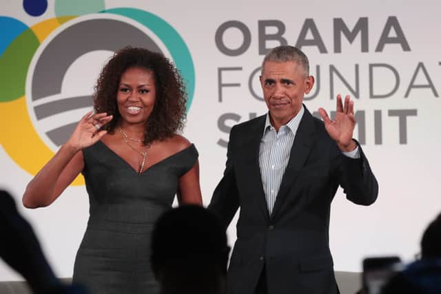 Former U.S. President Barack Obama and his wife Michelle close the Obama Foundation Summit together on the campus of the Illinois Institute of Technology on October 29, 2019 in Chicago, Illinois. (Photo by Scott Olson/Getty Images)