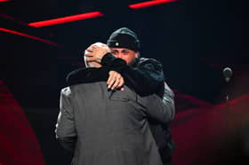 Don Jose Rivera presents Nicky Jam with the Hall of Fame award onstage during the 2022 Billboard Latin Music Awards. Picture: Jason Koerner/Getty Images)