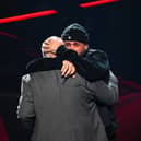 Don Jose Rivera presents Nicky Jam with the Hall of Fame award onstage during the 2022 Billboard Latin Music Awards. Picture: Jason Koerner/Getty Images)