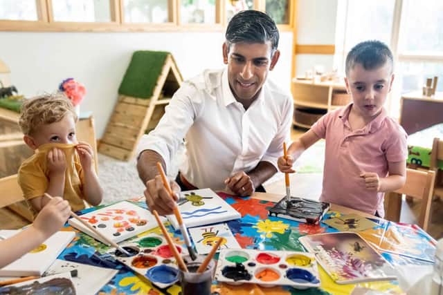 Britain's Prime Minister Rishi Sunak paints a bee during a visit to the Busy Bees nursery in Harrogate, North Yorkshire, on August 21, 2023. (Photo by Danny Lawson / POOL / AFP) (Photo by DANNY LAWSON/POOL/AFP via Getty Images)