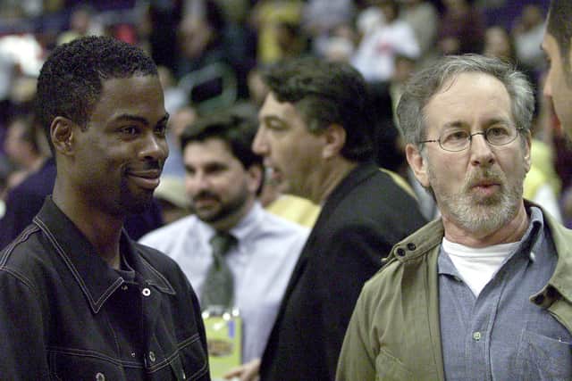 Actor Chris Rock and director Steven Spielberg watch Game 1 at courtside of the NBA Finals between the Los Angeles Lakers and the Indiana Pacers on June 7, 2000 in Los Angeles, CA. (Photo by Online USA)