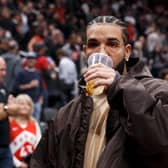 Drake pictured at Game Six of the Eastern Conference First Round between the Toronto Raptors and the Philadelphia 76ers at Scotiabank Arena on April 28, 2022 in Toronto, Canada. (Cole Burston/Getty Images)