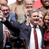 LIVERPOOL, ENGLAND - SEPTEMBER 27: Sir Keir Starmer with wife Victoria Starmer after delivering his leader's speech at the Labour Party Conference on September 27, 2022 in Liverpool, England. The Labour Party hold their annual conference in Liverpool this year. Issues on the agenda are the cost of living crisis, including a call for a reinforced windfall tax, proportional representation and action on the climate crisis. (Photo by Christopher Furlong/Getty Images)