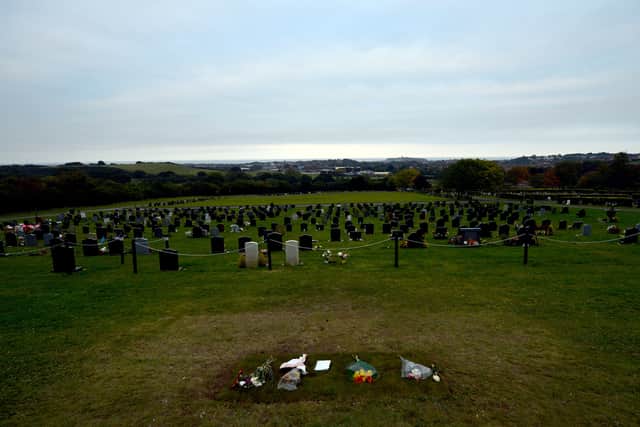 Jimmy Savile's unmarked grave the day after his headstone was removed