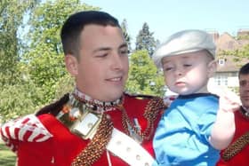 Lee Rigby in April 2011 with son Jack age 7 months. The son of murdered soldier Lee Rigby is aiming to raise £10,000 in a charity drive to help other bereaved forces children and "in honour of my dad" (PA)