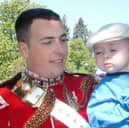 Lee Rigby in April 2011 with son Jack age 7 months. The son of murdered soldier Lee Rigby is aiming to raise £10,000 in a charity drive to help other bereaved forces children and "in honour of my dad" (PA)