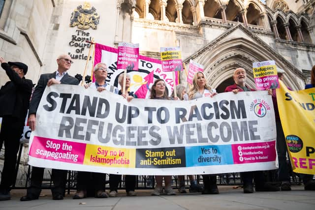 Dorset residents and supporters of Carralyn Parkes, outside the Royal Courts Of Justice in London, ahead of her legal challenge against the Home Office over the planned use of Bibby Stockholm in Dorset to house asylum seekers. Credit: James Manning/PA Wire