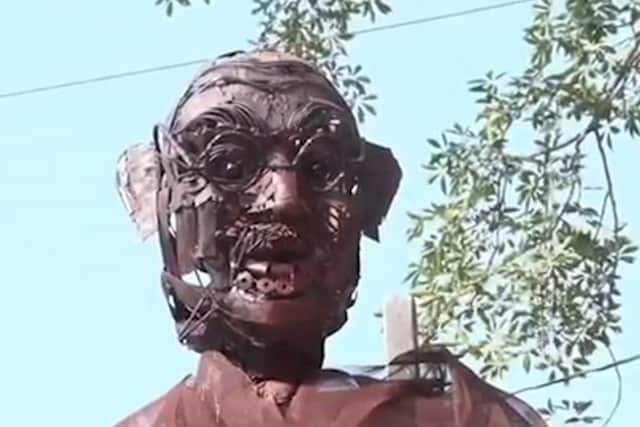 The statue of Mahatma Gandhi made of scrap turns out to have a 'scary' look, in northern India, October 2nd 2023. While the idea to use scrap items was good, the execution may have missed the point (Newslions / SWNS)