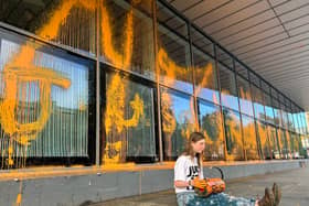 A protester today targeted the Alan Gilbert building at the University of Manchester (Photo: Just Stop Oil/Supplied)