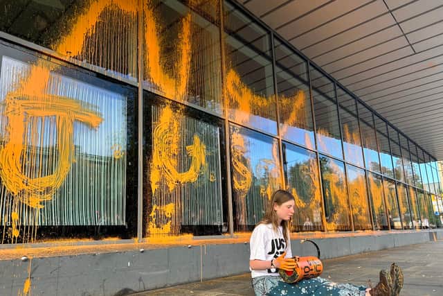 A protester today targeted the Alan Gilbert building at the University of Manchester (Photo: Just Stop Oil/Supplied)