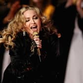 Let's celebrate Madonna rather than constantly talking about her age! INDIANAPOLIS, IN - FEBRUARY 05:  Singer Madonna performs during the Bridgestone Super Bowl XLVI Halftime Show at Lucas Oil Stadium on February 5, 2012 in Indianapolis, Indiana.  (Photo by Ezra Shaw/Getty Images)