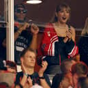 KANSAS CITY, MISSOURI - OCTOBER 12: Taylor Swift and Donna Kelce cheer before the game between the Kansas City Chiefs and the Denver Broncos at GEHA Field at Arrowhead Stadium on October 12, 2023 in Kansas City, Missouri. (Photo by David Eulitt/Getty Images)