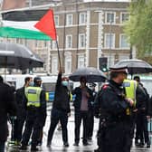 A 22-year-old woman has been arrested on suspicion of supporting proscribed organisation Hamas at a protest.
