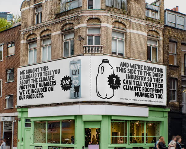 One of Oatly's new billboards in Shoreditch to launch their new campaign, to make carbon footprint info mandatory of food packaging (Photo: Oatly/Supplied)