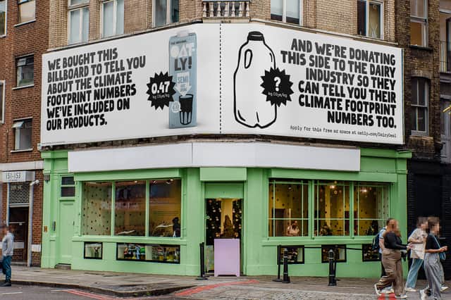 One of Oatly's new billboards in Shoreditch to launch their new campaign, to make carbon footprint info mandatory of food packaging (Photo: Oatly/Supplied)