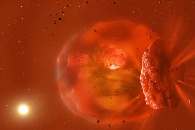 Impression issued by University of Bristol of the huge, glowing planetary body produced by a planetary collision (Image: University of Bristol/ PA)