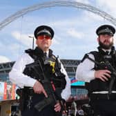 Two police officers are seen outside the stadium prior to The Emirates FA Cup Final between Arsenal and Chelsea at Wembley Stadium in May 2017 (Photo: Ian Walton/Getty Images)
