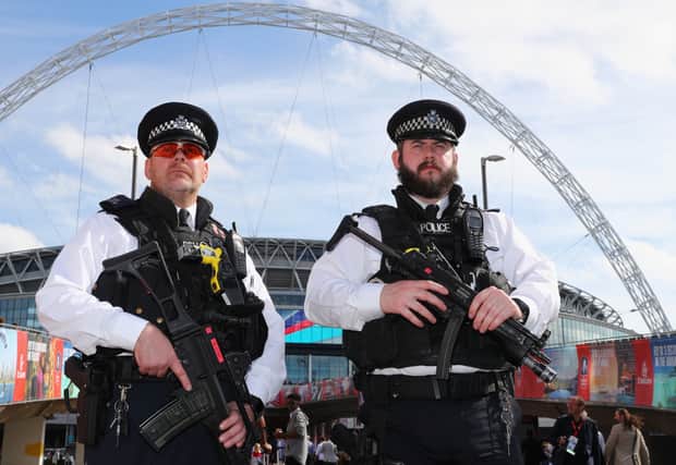 Two police officers are seen outside the stadium prior to The Emirates FA Cup Final between Arsenal and Chelsea at Wembley Stadium in May 2017 (Photo: Ian Walton/Getty Images)