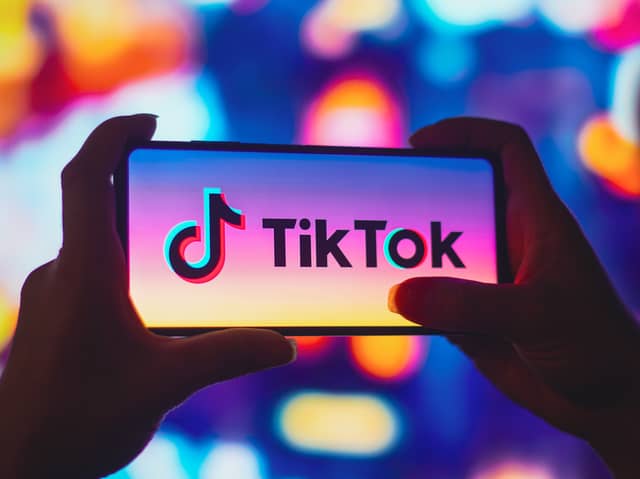 TikTok has launched a new Out of Phone campaign, which has been billed as an “out-of-home solution” that lets partners and brands leverage TikTok content beyond the platform and on to bigger screens such as billboards and cinemas. Image by Adobe Photos.
