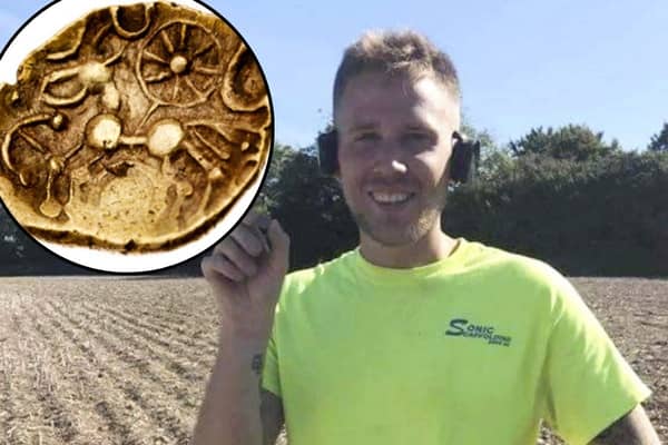 Lewis Fudge with the coin that dates to around 50 BC (SWNS)