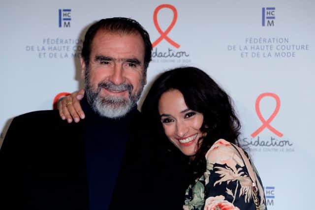 Eric Cantona with wife Rachida Brakni as he is set to begin his UK tour. The couple  pose during a photocall upon their arrival to the Diner de la Mode (Fashion Dinner), a fundraiser dinner in profit of the French anti-AIDS association Sidaction, at the Pavillon Cambon Capucines, in Paris, on January 23, 2020. (Photo by Thomas SAMSON / AFP) (Photo by THOMAS SAMSON/AFP v

