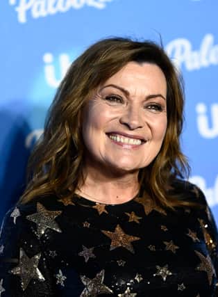 Lorraine Kelly's charity single has briefly knocked The Beatles off the top spot on the UK iTunes chart this week (Credit: Getty)