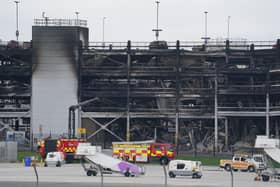 Police have arrested a man over fire that ripped through car park at Luton Airport. (Photo: Jacob King/PA Wire) 