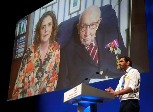 Captain Tom Moore and his daughter Hannah Ingram-Moore speaking via videolink at the opening of NHS Nightingale Hospital Yorkshire and Humber in North Yorkshire on April 21, 2020 in Harrogate, United Kingdom. (Photo by Danny Lawson - WPA Pool/Getty Images)