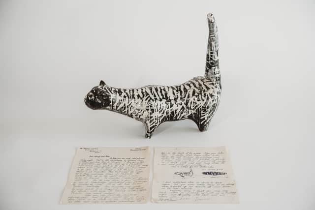 Rare black-and-white ceramic cat, created by David Hockney in 1955 sold for £111,875 at auction (Stacey's Auctioneers & Valuers / SWNS )