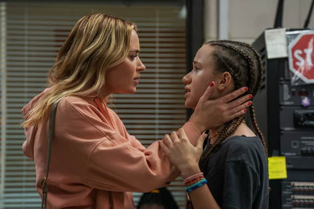 (L to R) Emily Blunt as Liza and Chloe Coleman as Phoebe in Pain Hustlers (Photo: Brian Douglas/Netflix)