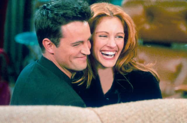 Matthew Perry previously dated Julia Roberts, who appeared on an episode of Friends. They are pictured together in the episode. Photo by Getty.