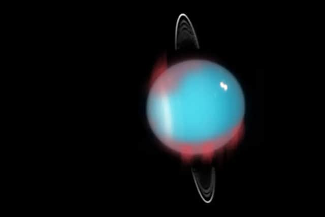 An artist's impression of the newfound infrared aurora superimposed on a Hubble Space Telescope photograph of Uranus. (Image: NASA/ESA/M. Showalter (SETI Institute))