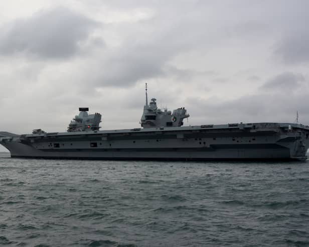 The Royal Navy’s aircraft carrier HMS Queen Elizabeth has docked in Portsmouth with F-35B jets on board. (Photo: Ben Mitchell/PA Wire) 
