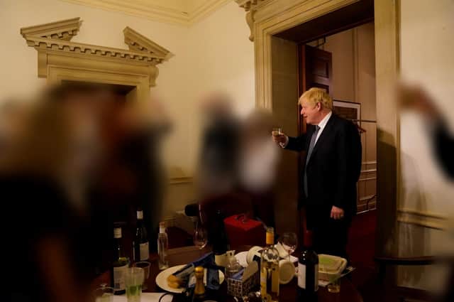 Boris Johnson having a toast at Lee Cain's leaving party on 13 November 2020 during the Covid pandemic. Credit: PA