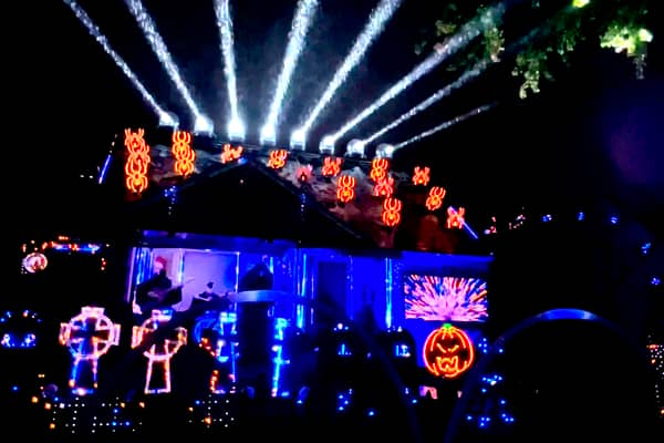 The house in Michigan, US, transformed into Halloween light show equipped with custom programmed lights and a Taylor Swift feature (Kyle Bostick / SWNS) 
