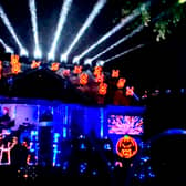 The house in Michigan, US, transformed into Halloween light show equipped with custom programmed lights and a Taylor Swift feature (Kyle Bostick / SWNS) 