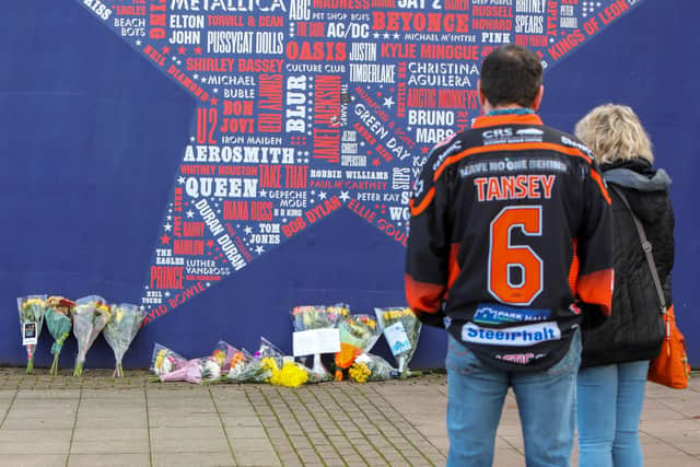Fans lay tributes at The Utilita Arena, Sheffield