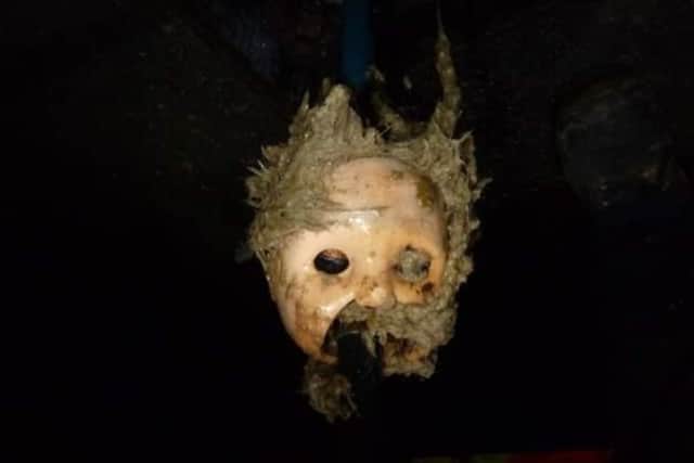 Wessex Water workers discovered a creepy doll’s head in a sewer in Bristol. (Photo: Wessex Water) 