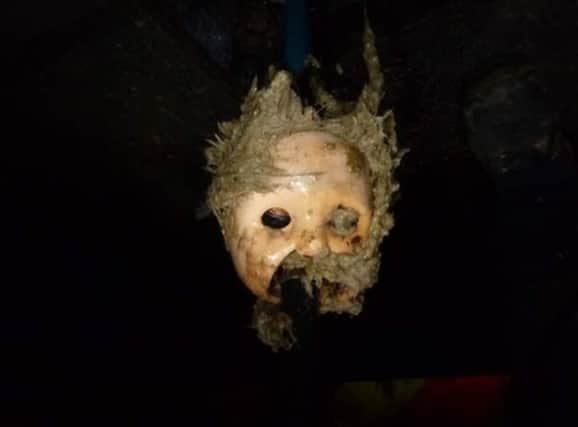 Wessex Water workers discovered a creepy doll’s head in a sewer in Bristol. (Photo: Wessex Water) 